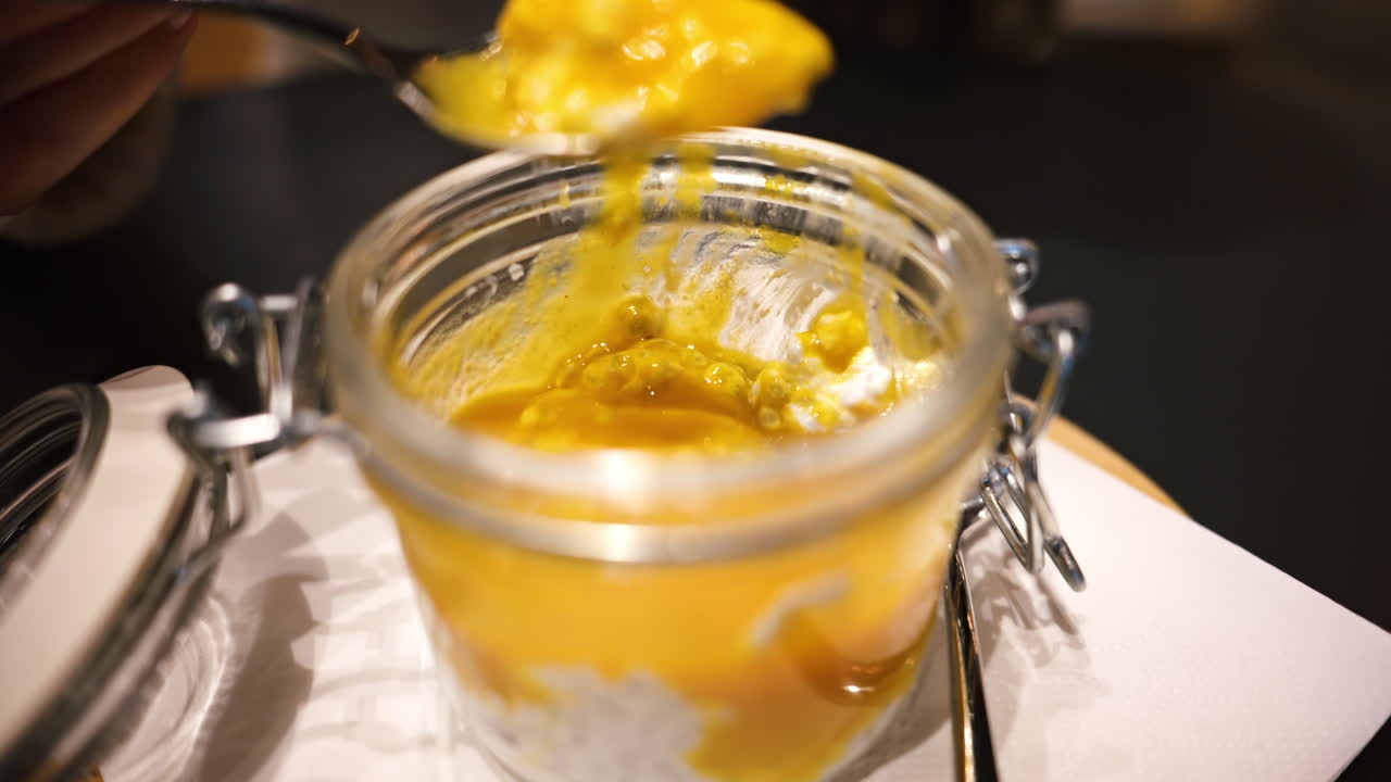 Coconut mango chia pudding in a glass jar