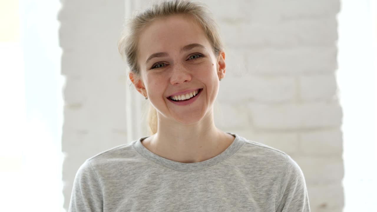 Portrait of Smiling Young Woman