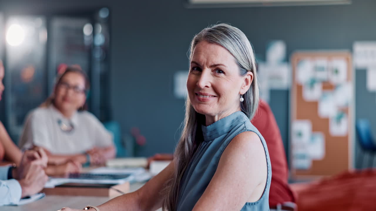 Face, business and senior woman in meeting