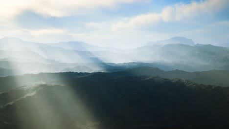 Paisaje-Desértico-Volcánico-Aéreo-Con-Rayos-De-Luz