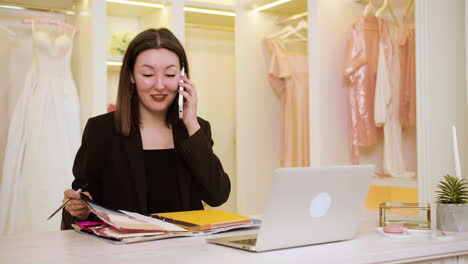 asian woman in wedding dress shop