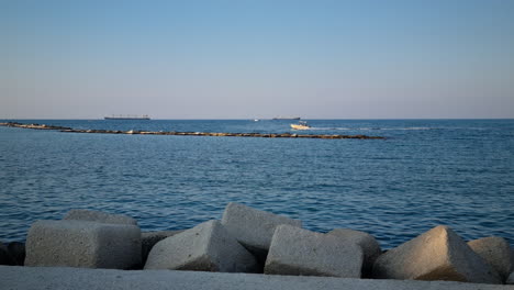 boat sailing near the coastline of bari puglia italy