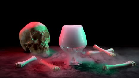 cognac glassful with smoke near the skull and bones on a black background - cognac glassful with smoke near the skull and bones on a black background with red and green light at dark studio