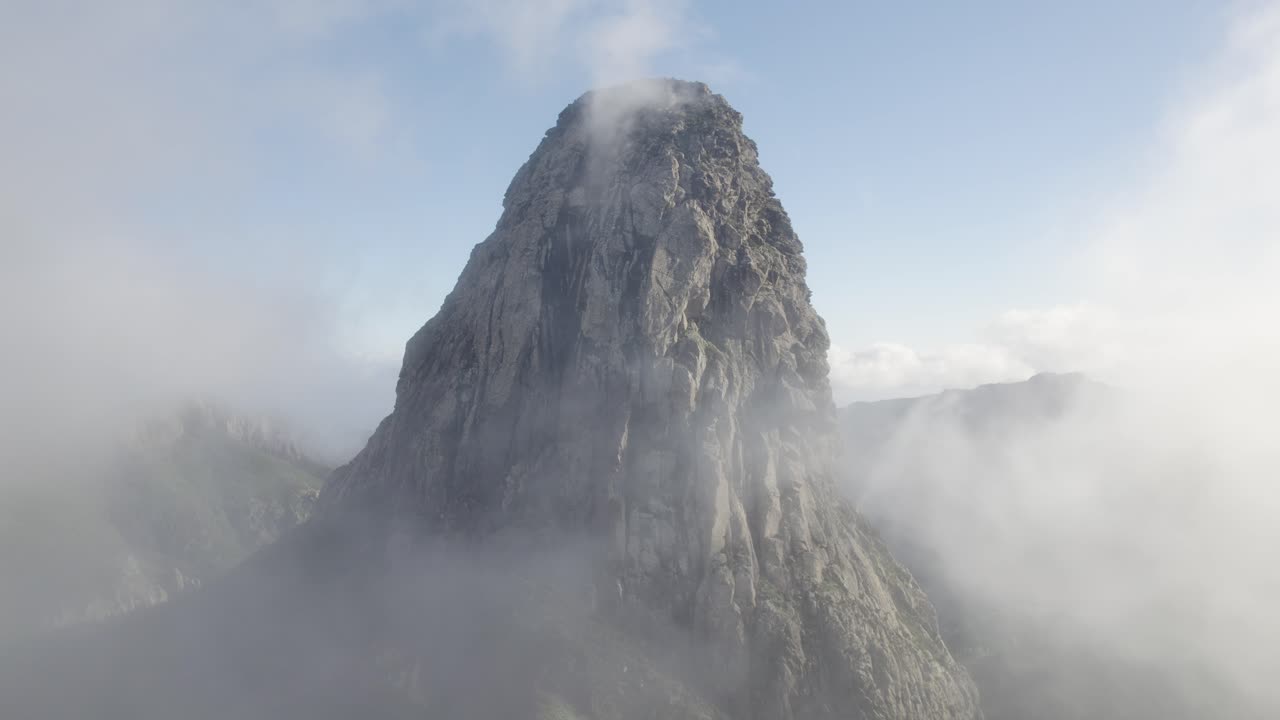 Footage of Roque de Agando surrounded by fog on the island of La Gomera in the Canary Islands
