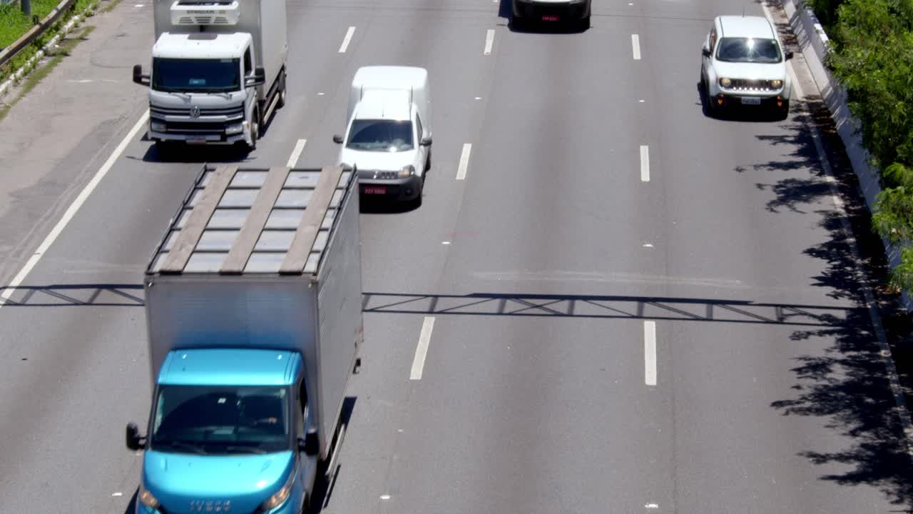 Trucks, vehicles endlessly streams, urban traffic a city’s dream