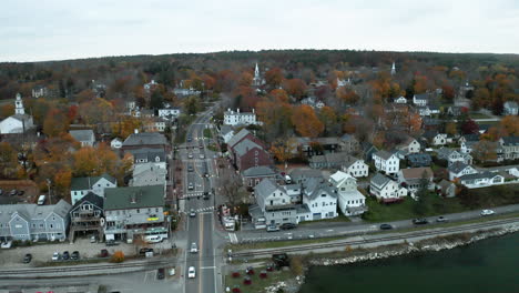 aerial footage of wiscasset, maine downtown in autumn during sunset