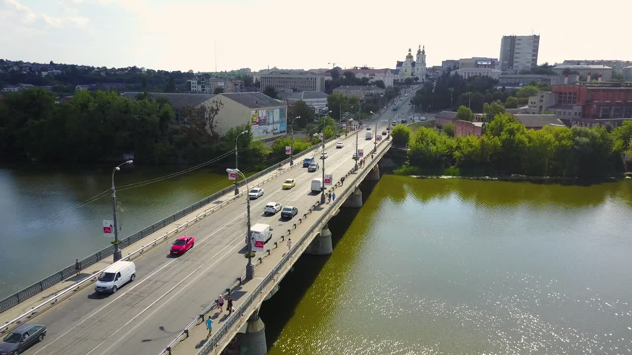 Bridge Road With Automobile Traffic. VINNITSA, UKRAINE - JULY 2017: Aerial top view of bridge road automobile traffic of many cars, transportation concept