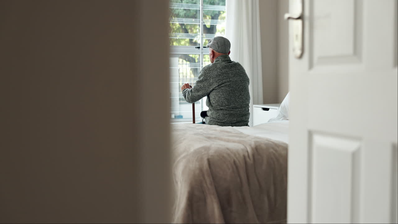 Elderly man in bedroom