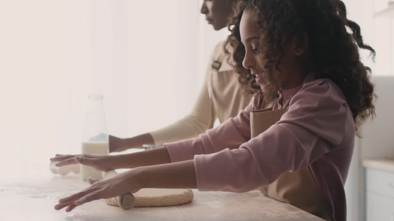 Mother and Daughter Baking Together