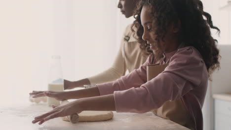 mother and daughter baking together