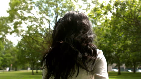 Carefree-brunette-running-in-the-park