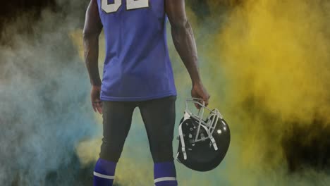 animation of colourful powders over american football player