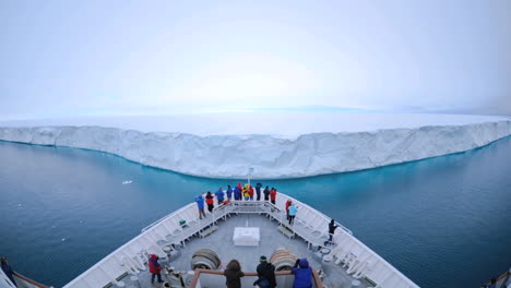 pov of a huge ship approaching to within feet of a massive iceberg near nordaustland norway