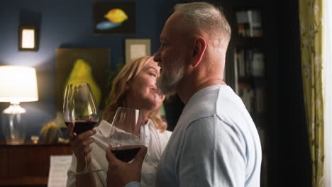 couple drinking wine at home