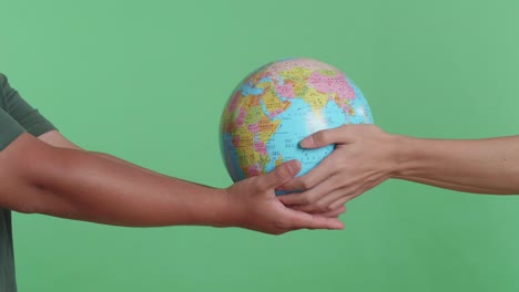 hands holding a globe