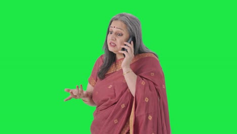 Angry-Indian-old-woman-shouting-on-phone-Green-screen