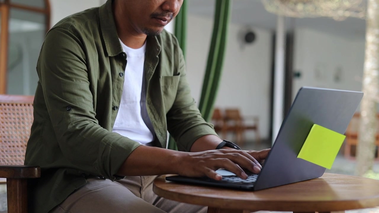 Asian man, hands and laptop for typing in cafe, business with remote work for startup. Male entrepreneur, website design and computer with email for plan on web, idea for creative development