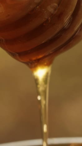 honey dripping from glass