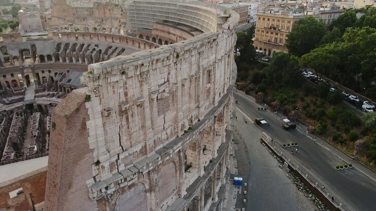 Timeless architecture meets warm evening glow in this aerial Colosseum frame
