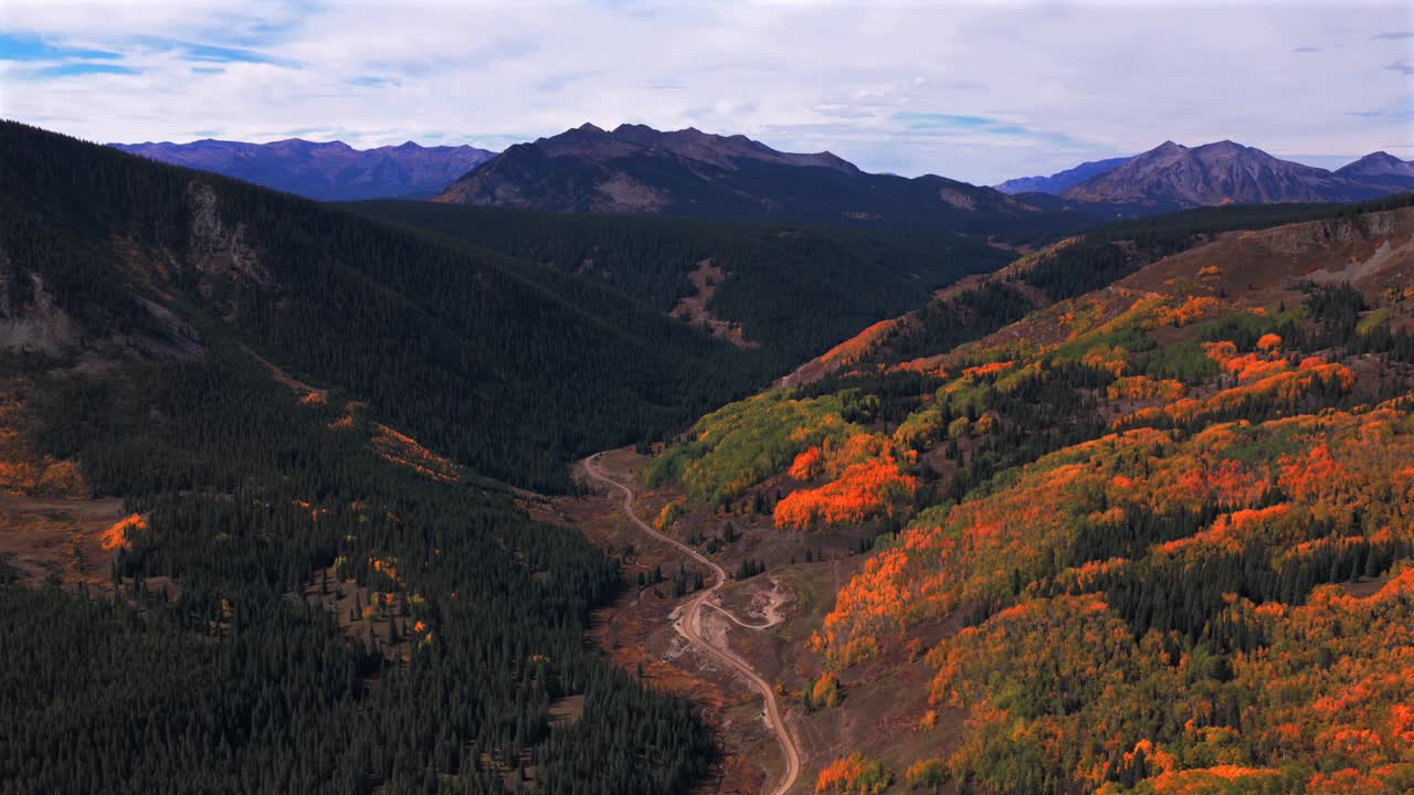 Crested Butte ski town Colorado fall autumn season Ohio Swampy Kebler Pass Lake Irwin aerial drone Rocky Mountains Elk Range Gunnison national forest colorful Aspen Trees windy dirt road forwards