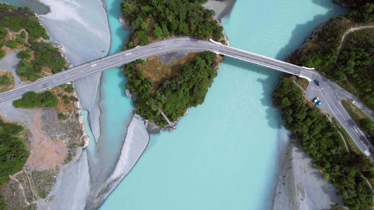 Aerial view of traffic driving across a bridge on the Rakaia River, New Zealand