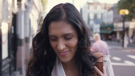 Beautiful-Indian-woman-walking-through-city