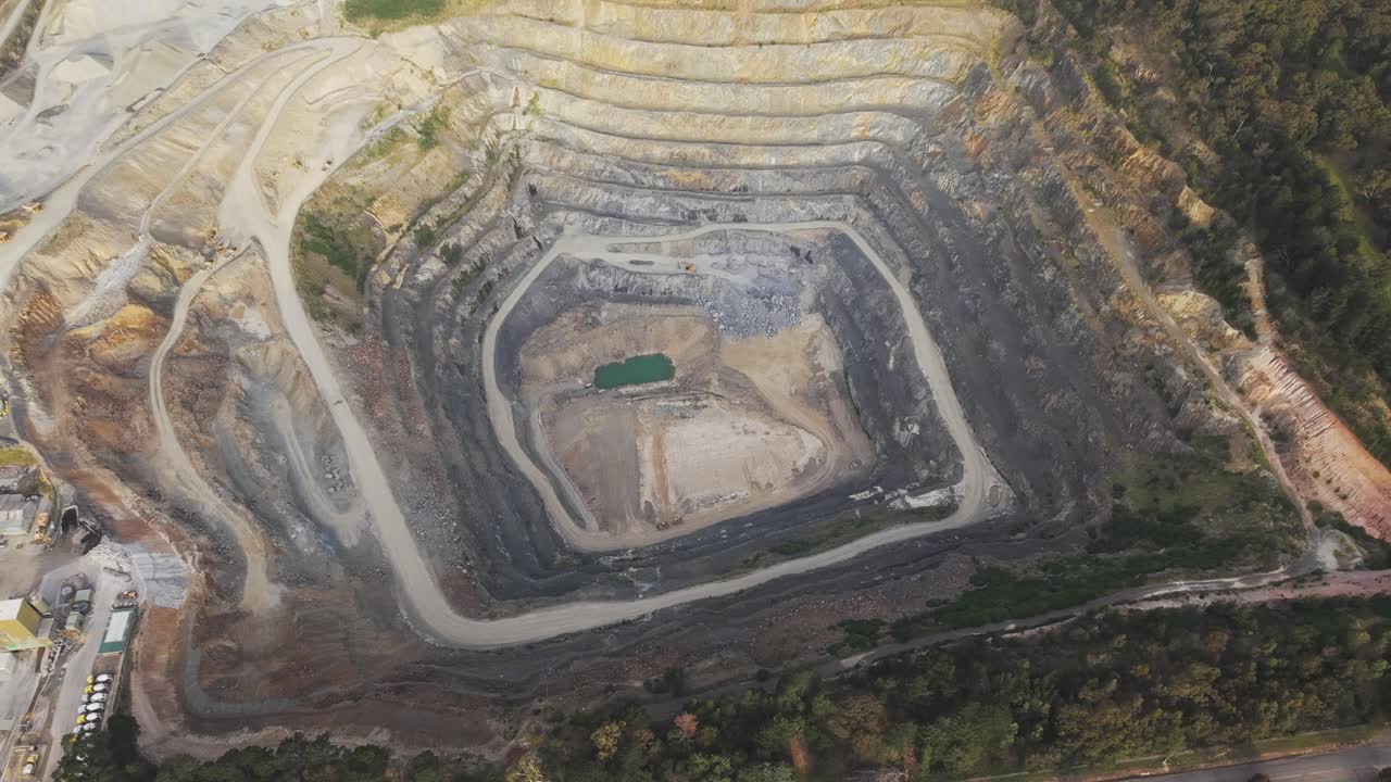 Stunning aerial footage showcases the vast expanse of Boral Quarry, highlighting its layered rock formations, rugged terrain, and industrial scale. Captured with a high-definition drone