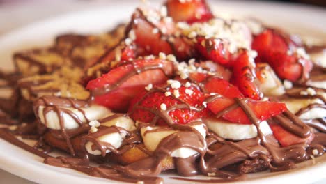 chocolate waffle with strawberries and bananas