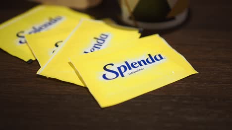 close-up of splenda sweetener packets on a table