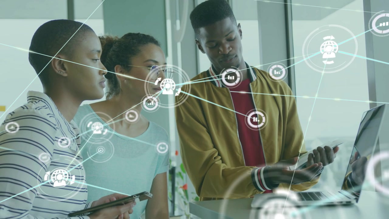 Team leaning by laptop as man tapping tablet triggers network nodes overlay expanding for tech demo
