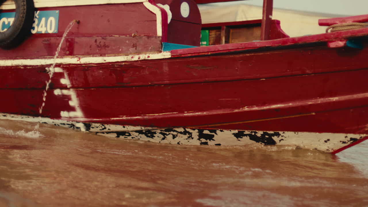 Red Wooden Boat on River