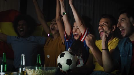 Handheld-video-of-fans-cheering-and-celebrating-victory