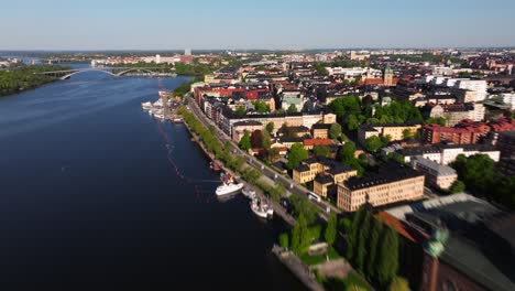 cinematic hyperlapse above gamla stan, stockholm city hall on beautiful summer day in sweden