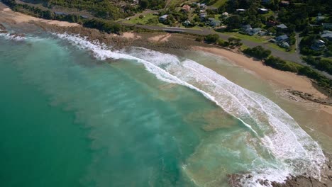 Beautiful-aerial-shot-of-turquoise-ocean-and-surf-on-Australia's-iconic-Great-Ocean-Road-highway-near-Wye-River,-Victoria