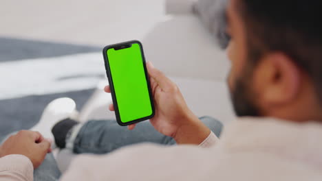Man,-cellphone-screen-and-green-mockup-on-sofa-to