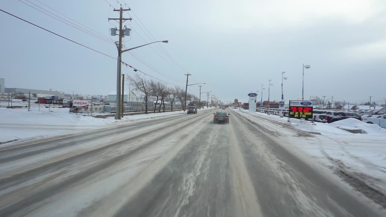 Driving in Dawson city, on a winter day, in Yukon, Canada