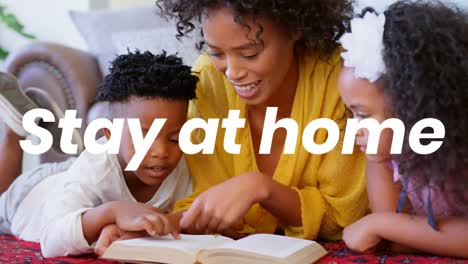 Animation-of-stay-at-home-text-over-mother-with-son-and-daughter-reading-at-home