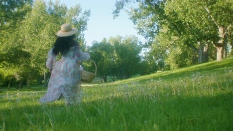 Black-Woman-on-picnic-in-park-running-away-low-angle-tilt