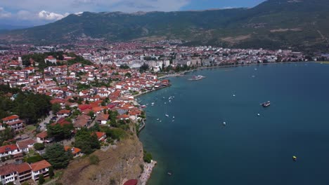 cinematic drone view over scenic lake ohrid and ohrid on summer's day - macedonia