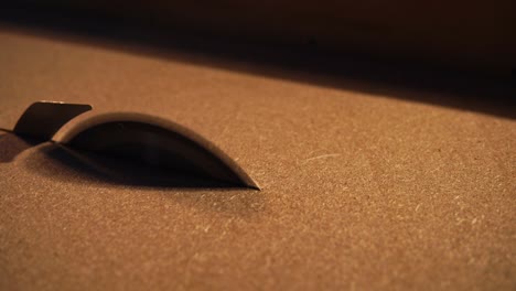 close-up of a table saw blade and cutting surface