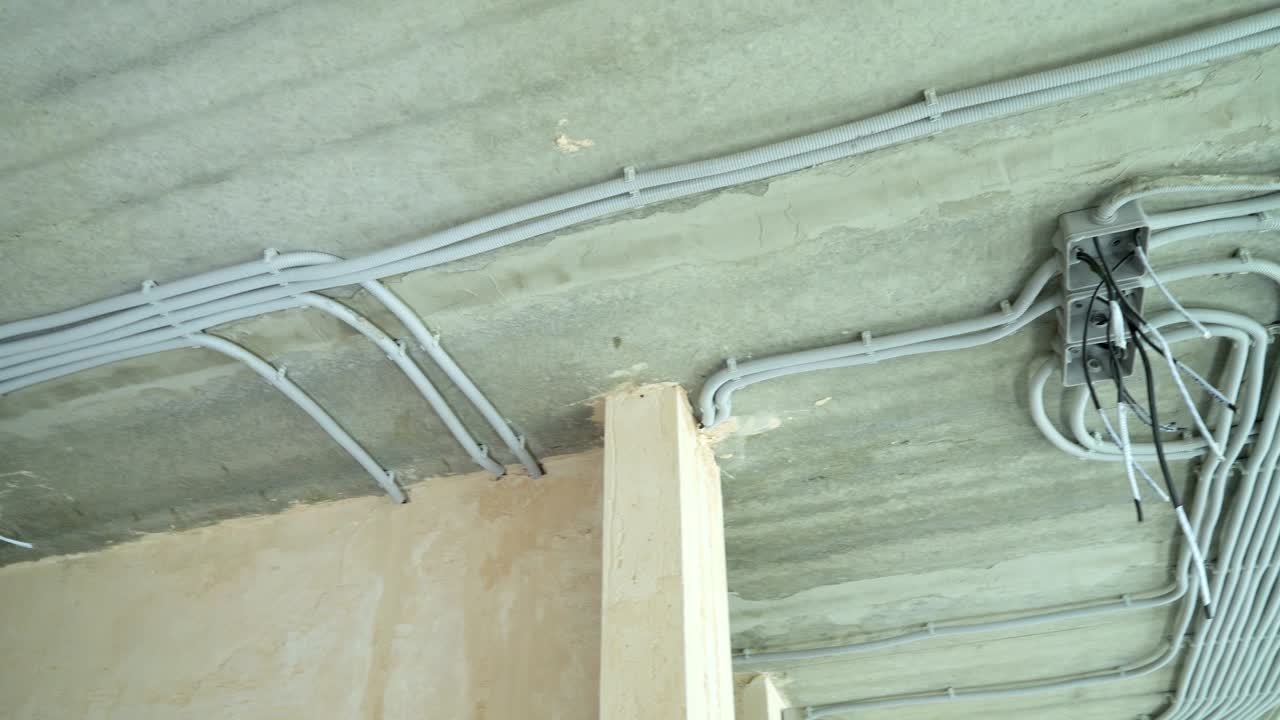 Electrical installation of plastic electrification tubes on building site