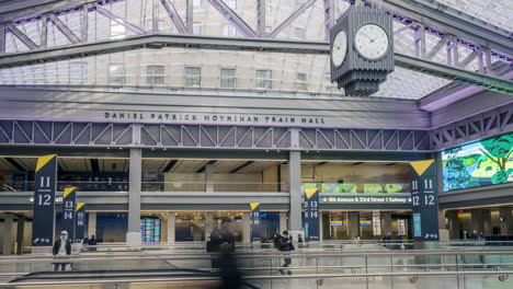 new york ny usa-january 8th, 2021 visitors to the daniel patrick moynihan train hall at pennsylvania station in new york enjoy the new space from the main level.