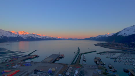 amazing drone view of seward alaska seward boat harbor and the mountains at sunset