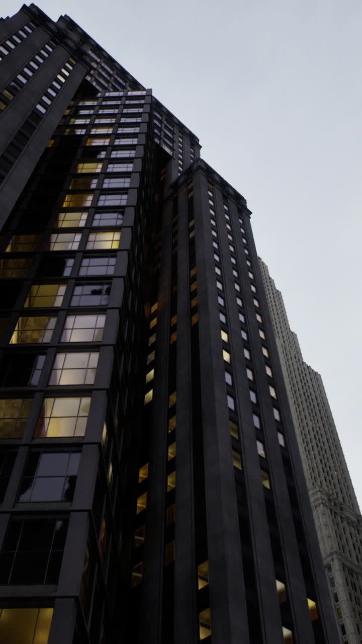Tall buildings reflecting twilight in a bustling urban landscape