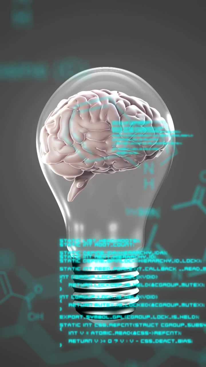 Vertical video: Clear bulb with brain rotating after teal code scrolling, tagging regions for tech