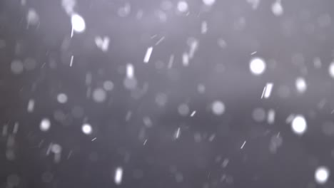 Snowfall-Against-Black-Background