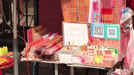 incense and offerings displayed at temple market