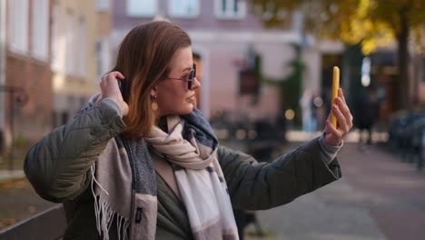 woman taking a selfie outdoors