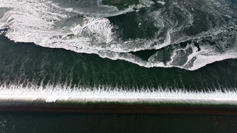 Aerial-of-water-fall-at-dam