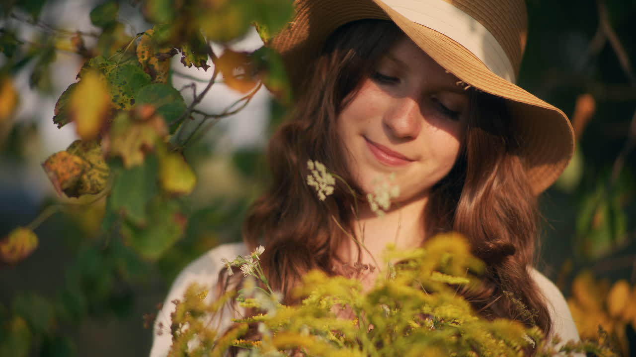 Dreamy girl with wildflowers bouquet
